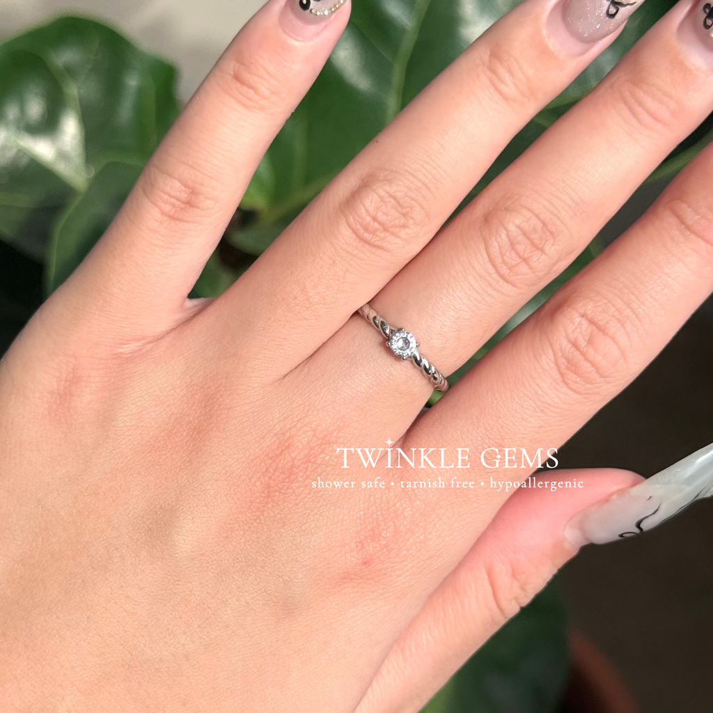 Halo Twist Solitaire Ring