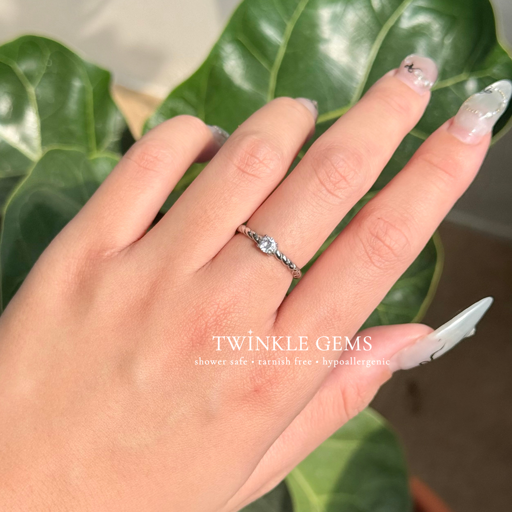 Halo Twist Solitaire Ring