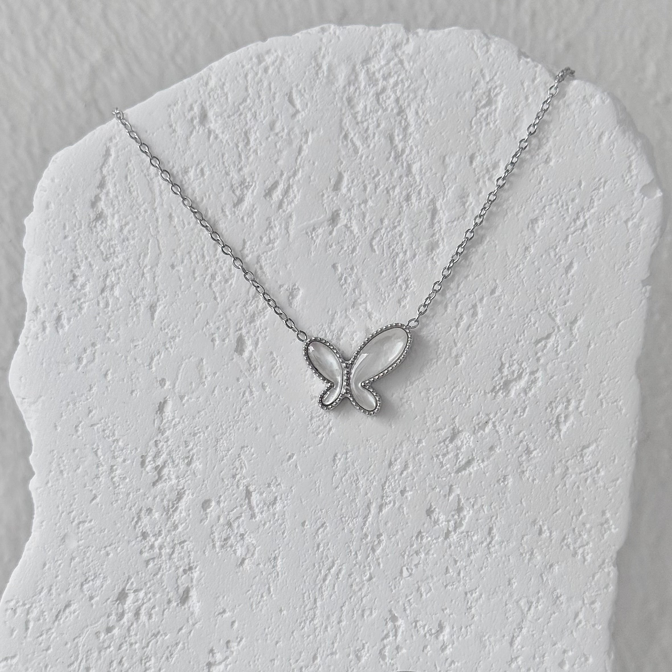 Elsa Butterfly in White Conch Necklace